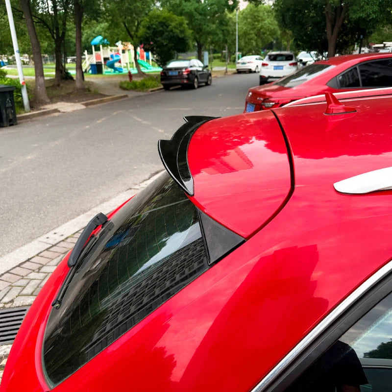 Audi A3 8V Sportback Rear Roof Spoiler Carbon Fiber Installed on a Red 2014-2020 A3 Hatchback - Rear Three-Quarter On-Car View