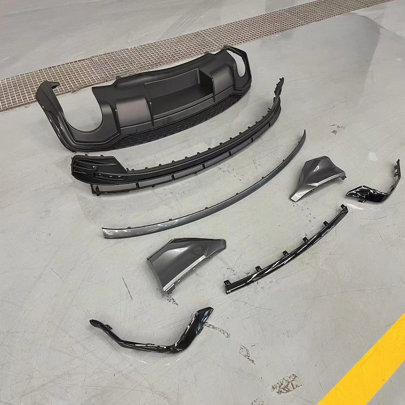 Bolt-on installation of rear diffuser using factory mounting points on Audi Q3 F3