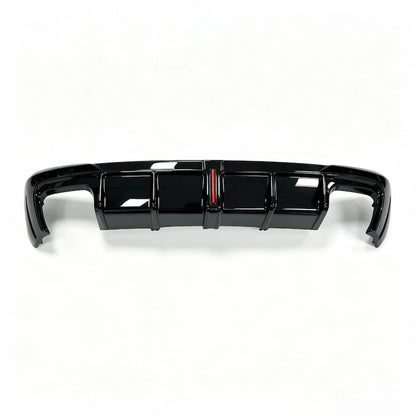 2020-2024 Audi A4 Sline Rear Diffuser with LED in gloss black finish installed on car rear bumper, showing bright LED brake light illumination and aggressive RS4-style diffuser fins.