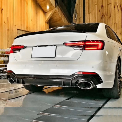 Audi A4 B9 RS4 Style Rear Bumper Diffuser Installed - White Workshop View